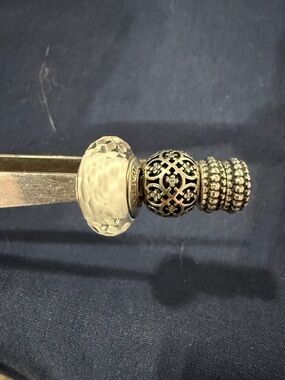 Pandora White Faceted Murano Glass Charm, which features white glass